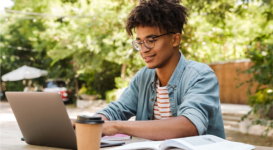 Young man on his computer