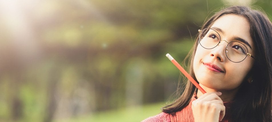 female student pondering