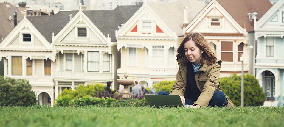 female student studying outside