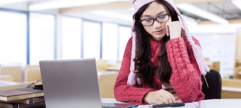 female student calculating