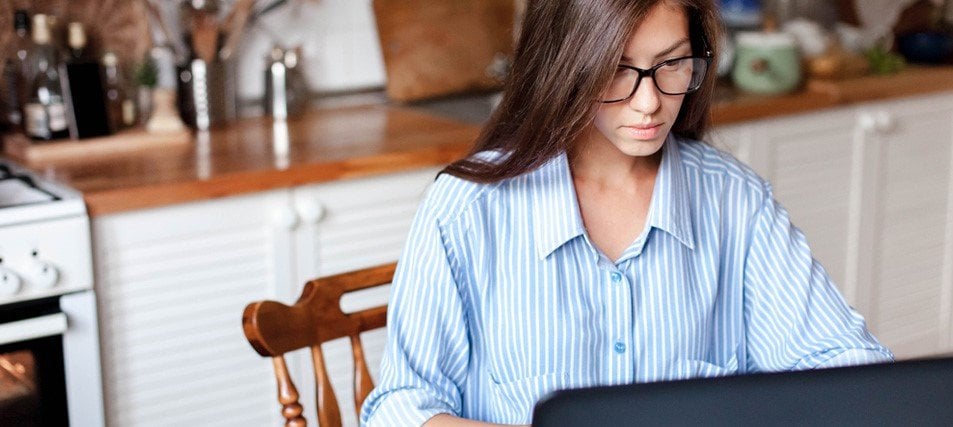 female student studying at home