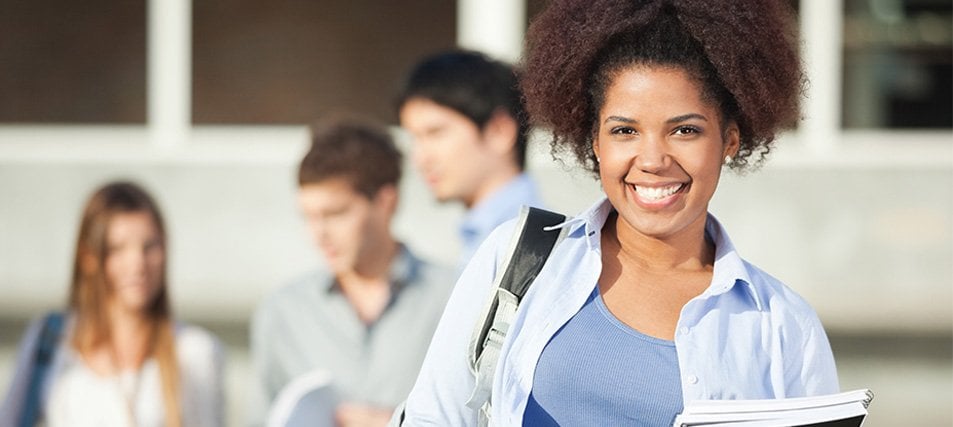 female student smiling in a group