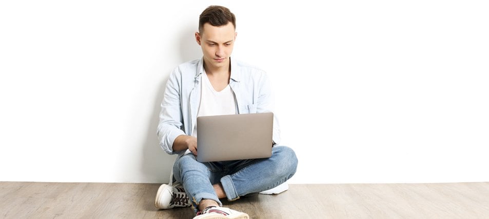 male student on laptop