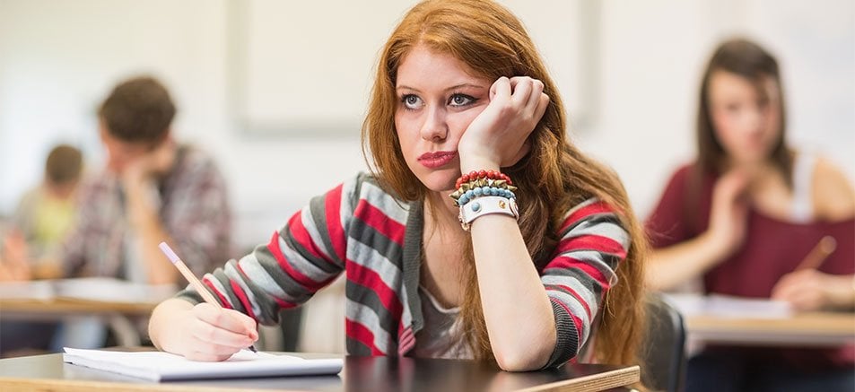 female student in college classroom