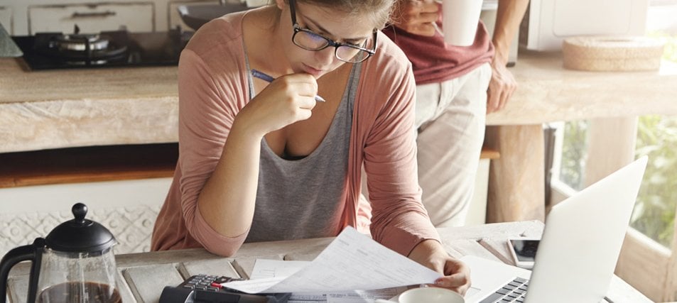 female student looking at forms