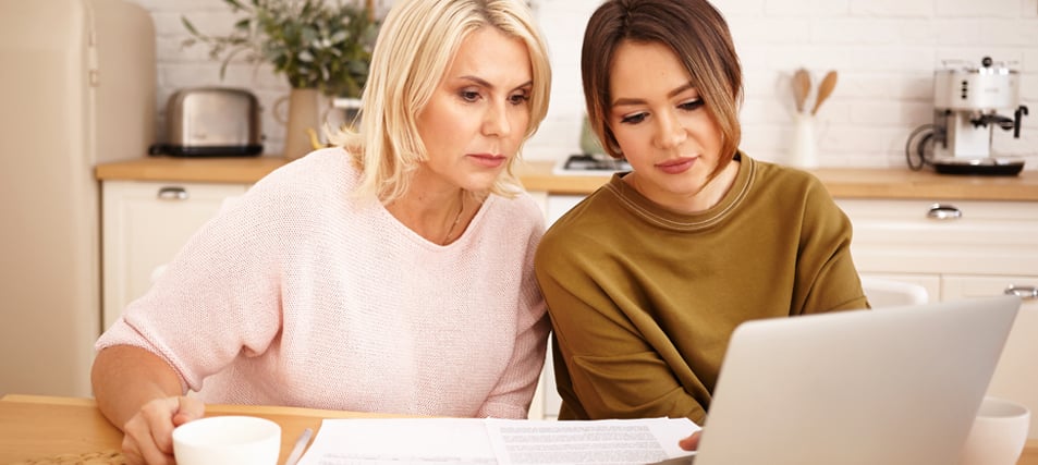 mother and female student discussing