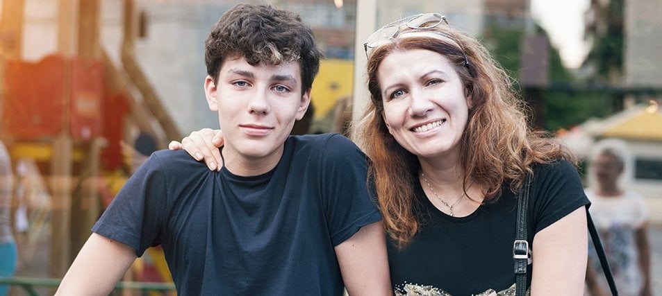 male student and his mom