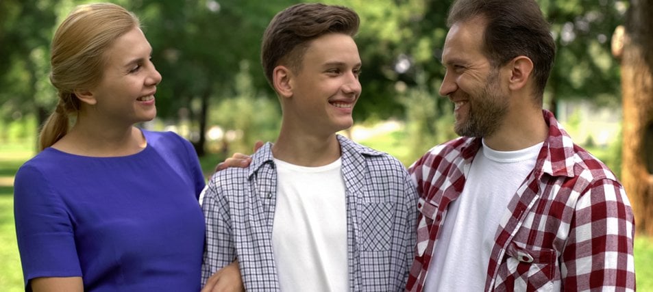 male student with parents